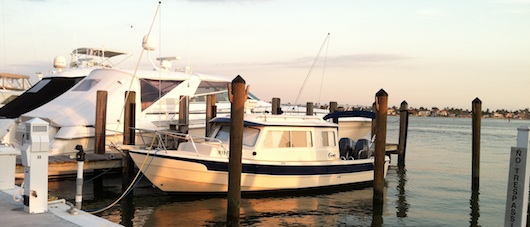 Boat Docked at the Cove Inn on Naples Bay Florida