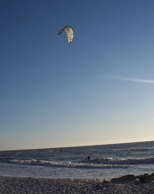 Kite boarding in front of Naples Beach Resort in Florida