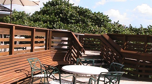 Naples Grande Beach Resort - Tables by the beach