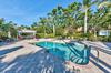 Resort style pool, hot tub, and BBQ area